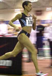 Regina Jacobs on her way to claim the 2 Mile American Record at the Boston Indoor Games. Photo by Stanley Hu.