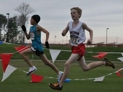 Daniel O'Donoghue runs to an All-American 24th palce in the Midget Boys race (photo: Emer)